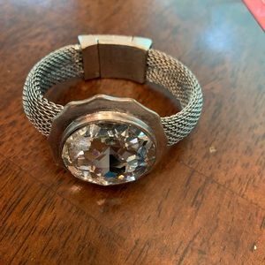 Silver tone mesh bracelet with stones